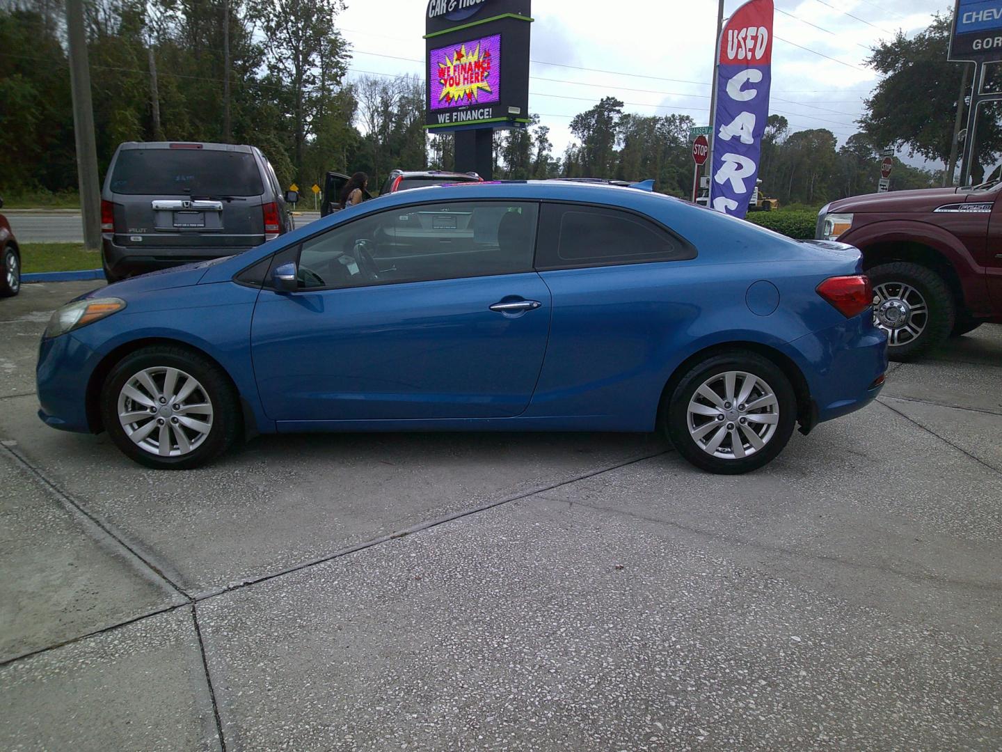 2014 BLUE KIA FORTE KOUP EX (KNAFX6A84E5) , located at 1200 Cassat Avenue, Jacksonville, FL, 32205, (904) 695-1885, 30.302404, -81.731033 - Photo#4